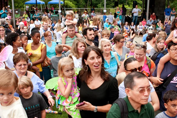 Crowd Gathers To View Release of Butterflies At Summer Festival