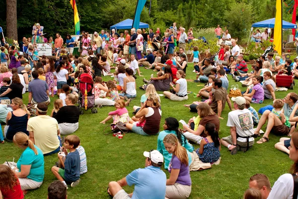 Crowd Sits And Waits For Release of Butterflies At Festival
