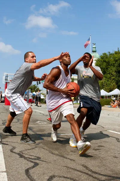 Man Drives To The Basket In Outdoor Street Basketball Tournament