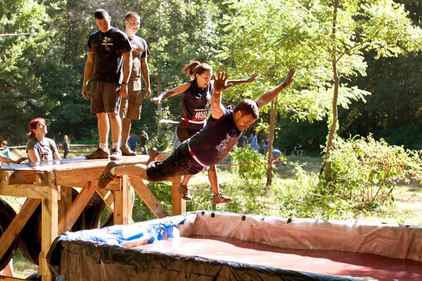 People Dive Into Blood Pit On Zombie Obstacle Course Race
