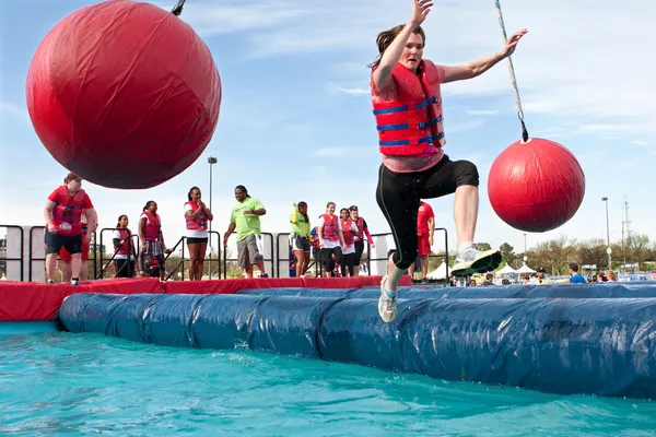 Woman Falls Into Water At Crazy Obstacle Course Race