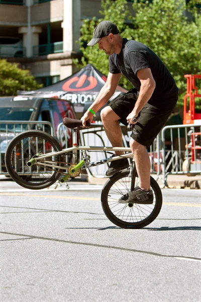 Man Practices Riding Bike Backwards Before BMX Contest