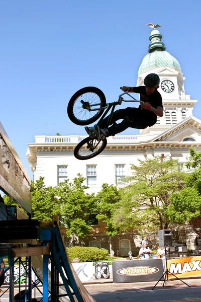 Teenage Boy Practices Ramp Jumps At BMX Competition