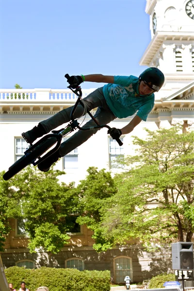 Teen Practices BMX Jumping Tricks For Athens Competition