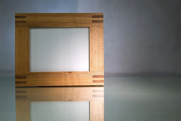 Solid wood blank picture frame glass on your desktop