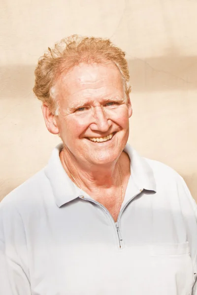 Senior Male Model With blue eyes smiling