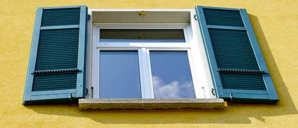 Window on the house in the town on the mountain hill called Gandria, Switzerland