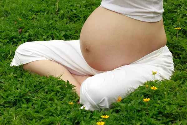 Pregnant mom in the garden