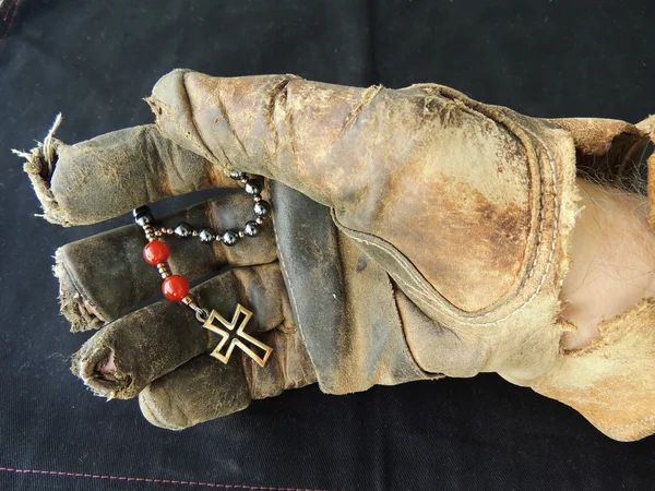 Leather Work Glove Holding Anglican Prayer Beads