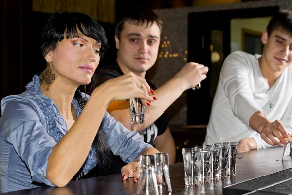 Woman drinking vodka shots