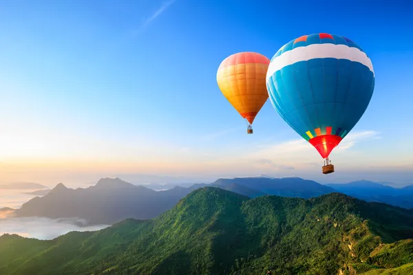 Colorful hot-air balloons flying