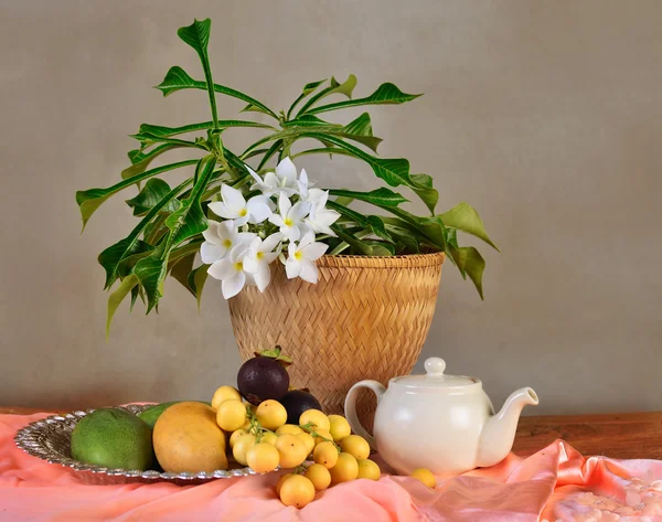 Tropical fruit and flower composition