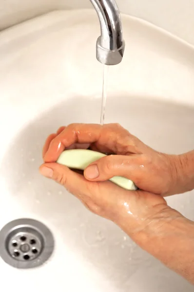 Woman washing hands