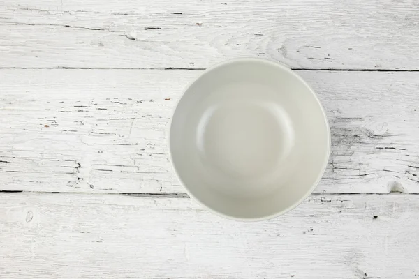 Empty clean plate  on white table