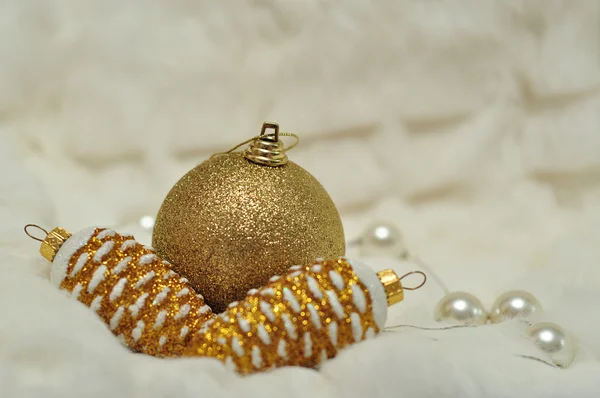 Christmas decorations in gold and white blurred