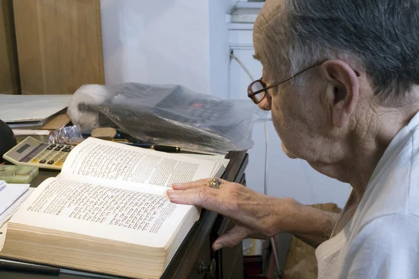 Senior with Jewish Prayer Book