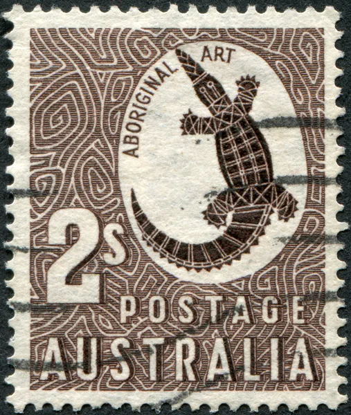 A stamp printed in Australia shows Aboriginal Art, Crocodile, circa 1948