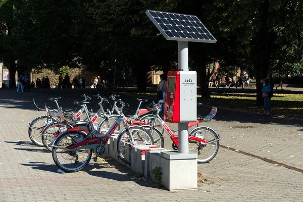Bicycle rental company Deutsche Bahn (German Railways), autonomous (solar panels) work machine to pay rent