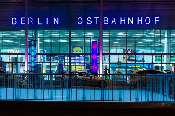 Berlin Ostbahnhof in the night illumination. Berlin Ostbahnhof (Berlin East railway station) is a mainline railway station in Berlin
