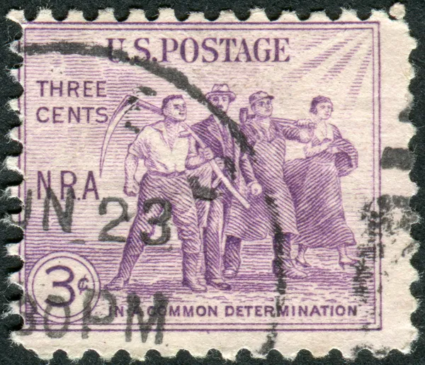 Postage stamp printed in USA, National Recovery Act Issue, shows Group of Workers