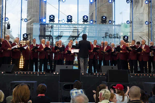 Choir near the Brandenburg Gate. The Day of German Unity is the national day of Germany