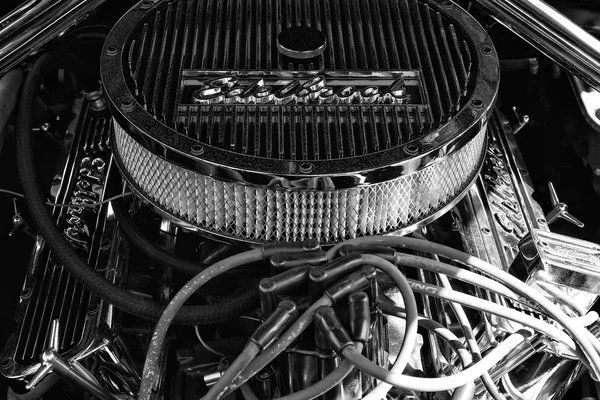 Detail of engine Ford Mustang closeup, black and white