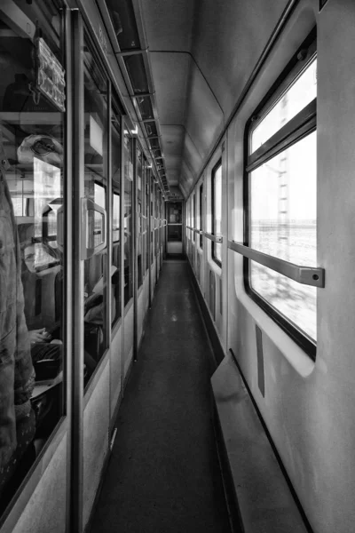 Interior the rail car. Black and white.