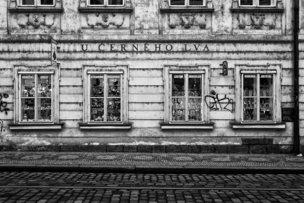 The streets of old Prague. Gift shop. Stylized film. Large grains. Black and white.