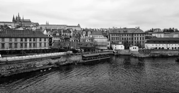 View of old Prague and St. Vitus Cathedral. Black and White. Stylized film. Large grains