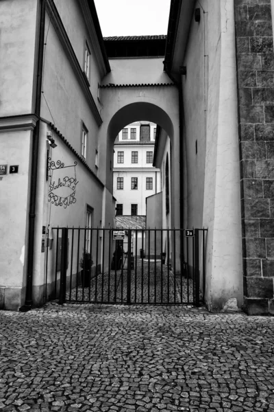 The streets of old Prague. Stylized film. Large grains. Black and White.