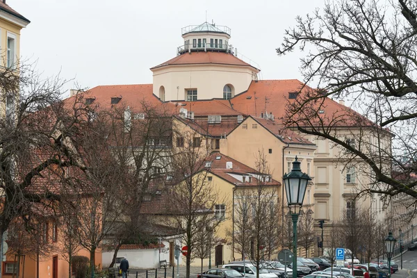 The streets of old Prague. In the background Czech Museum of Music