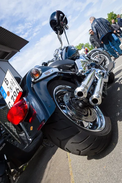 BERLIN, GERMANY - MAY 17, 2014: Motorcycle Harley Davidson Softail. Rear view. 27th Oldtimer Day Berlin - Brandenburg