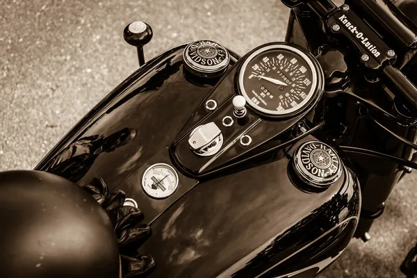 BERLIN, GERMANY - MAY 17, 2014: The dashboard and fuel tank of the motorcycle Harley-Davidson. Sepia. 27th Oldtimer Day Berlin - Brandenburg