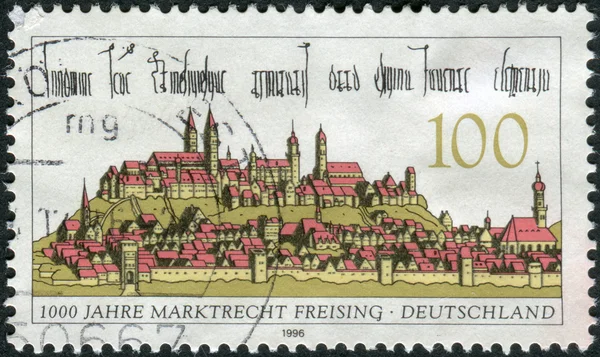Postage stamp printed in Germany, dedicated to the 1000th anniversary of Freising's Right to Hold Markets, shows a city view from the engraving (1642) by Matthaeus Merian