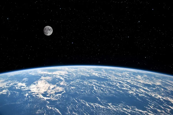 The Moon over planet Earth.