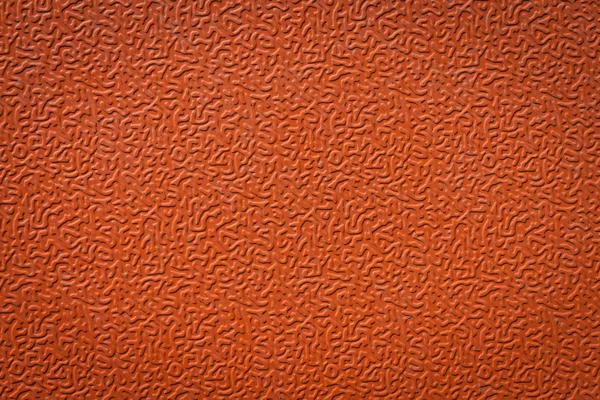 Orange textured plastic.