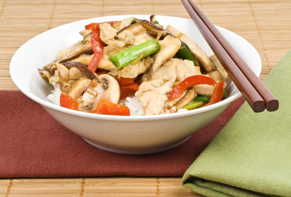 Stir Fried Chicken with Mushrooms Over Rice