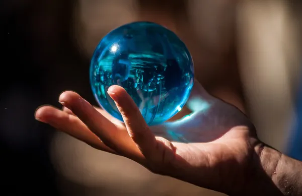 Crystal ball in hand