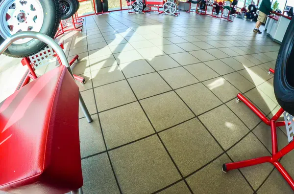 Car tires on display for sale at a tire shop store