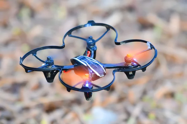 Remote controlled quadcopter drone in mid air