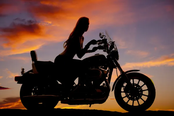 Woman motorcycle silhouette riding