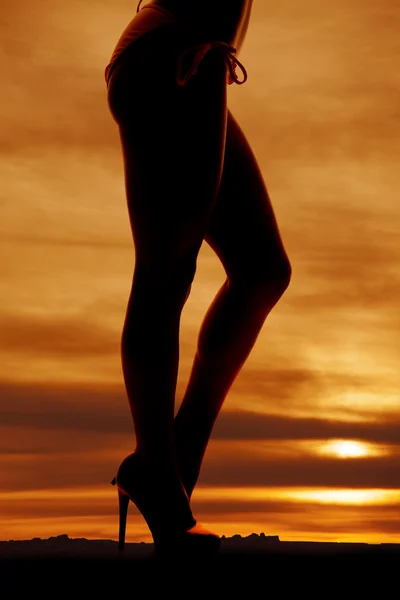 Woman legs side bikini bottoms