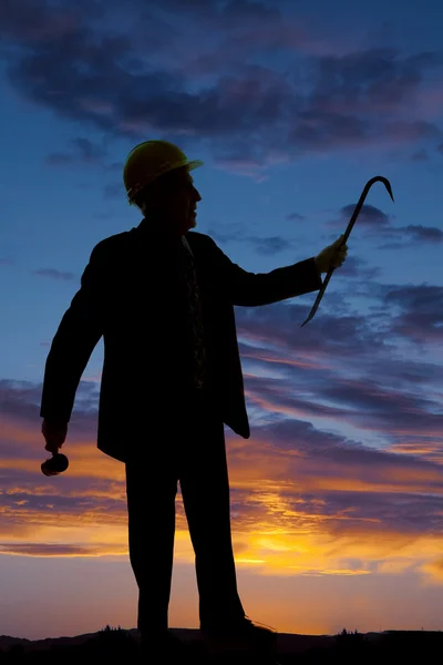 Elderly man silhouette hard hat