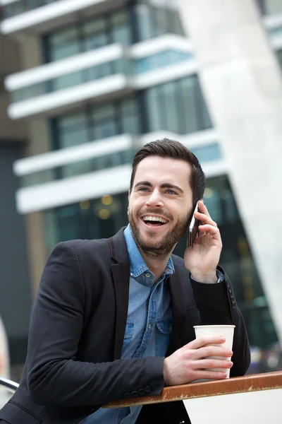 Smiling man with cellphone