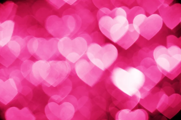 Pink bokeh of hearts background