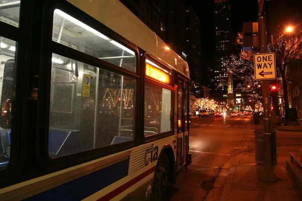 CTA bus in Chicago downtown at night