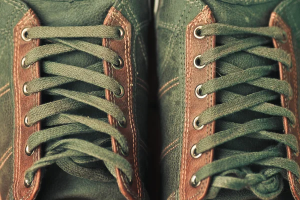Brown leather shoe laces in close-up