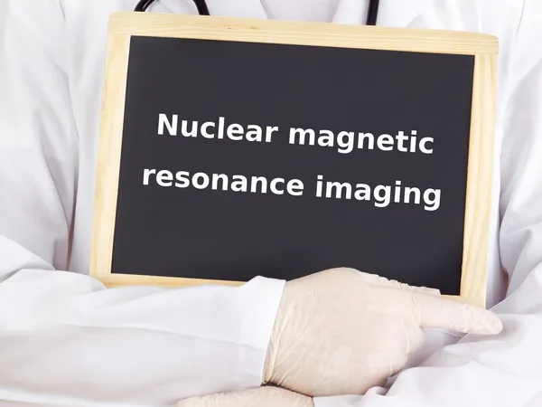 Doctor shows information: nuclear magnetic resonance imaging