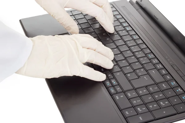 Person typing on the computer