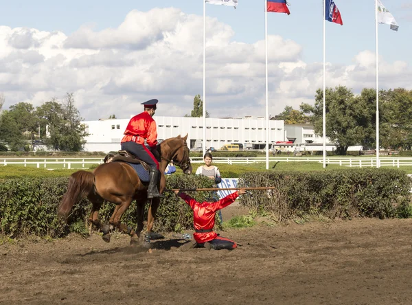 ROSTOV-ON-DON, RUSSIA-SEPTEMBER 22 - The horseman on a horse jum